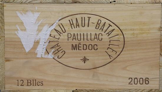A case of twelve bottles of Chateau Haut-Batailley, Pauillac, 2006, in unopened wooden case with Hicks & Don Wine Merchants label.